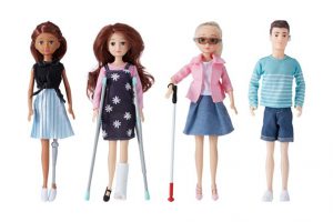 four dolls with disabilities, doll with artificial limp, doll using crutches, doll with walking stick for the low vision, and doll with hearing aid