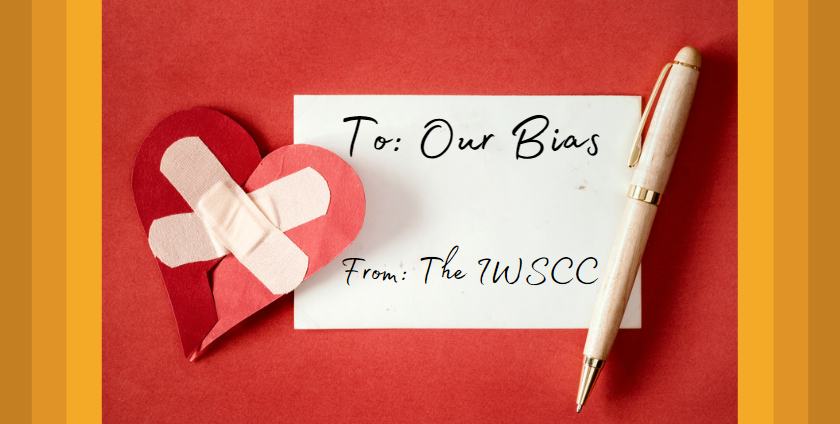A letter reads “To our bias, From the IWSCC.” A bandaged broken heart and ivory pen rest beside.